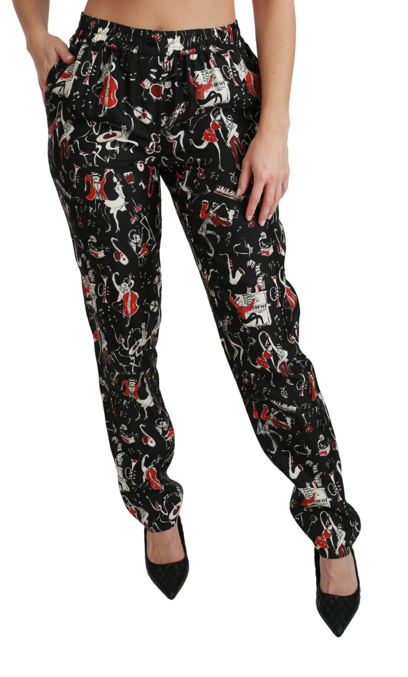 Pantalon mi-hauteur en soie noire à motifs instrumentaux de Dolce &amp; Gabbana