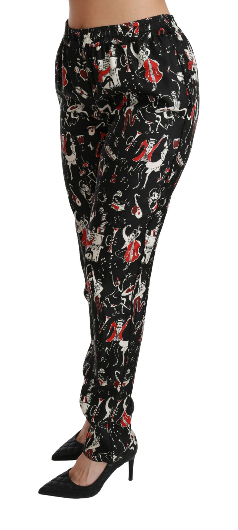 Pantalon mi-hauteur en soie noire à motifs instrumentaux de Dolce &amp; Gabbana