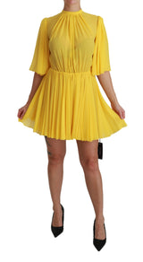 Robe Dolce &amp; Gabbana jaune plissée trapèze mini 100% soie