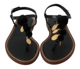 Sandales tongs en cuir noir avec des pièces de monnaie Dolce &amp; Gabbana