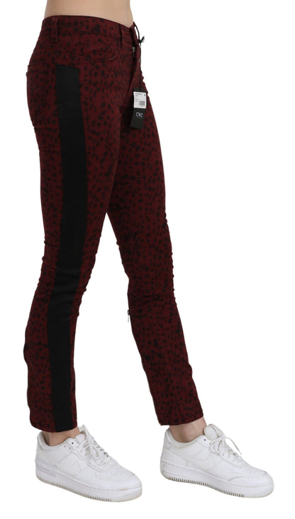 Costume National donkerrode, middelhoge, smalle katoenen jeans.