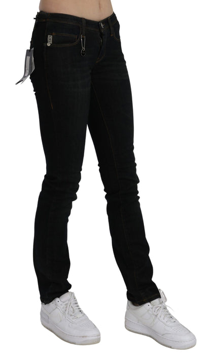 Costume National - Jean en coton délavé noir, taille mi-hauteur, coupe skinny.