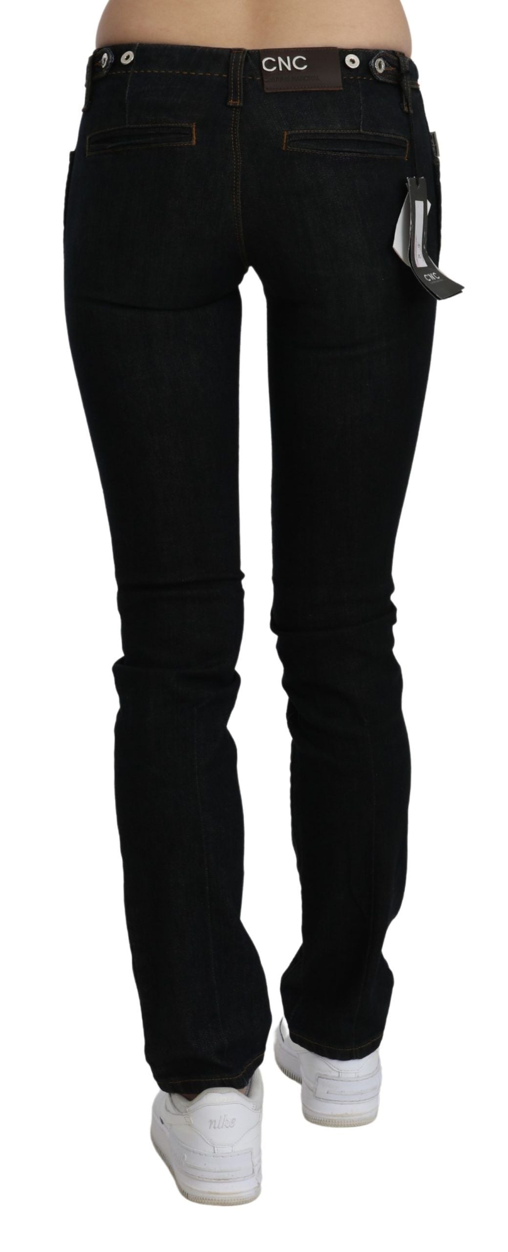 Costume National - Jean en coton délavé noir, taille mi-hauteur, coupe skinny.