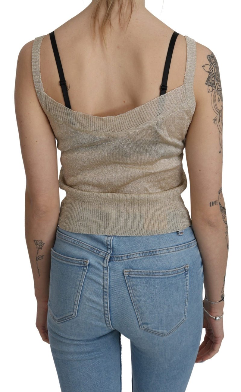 BYBLOS Haut beige sans manches, dos nu, avec fines bretelles, en tissu transparent.