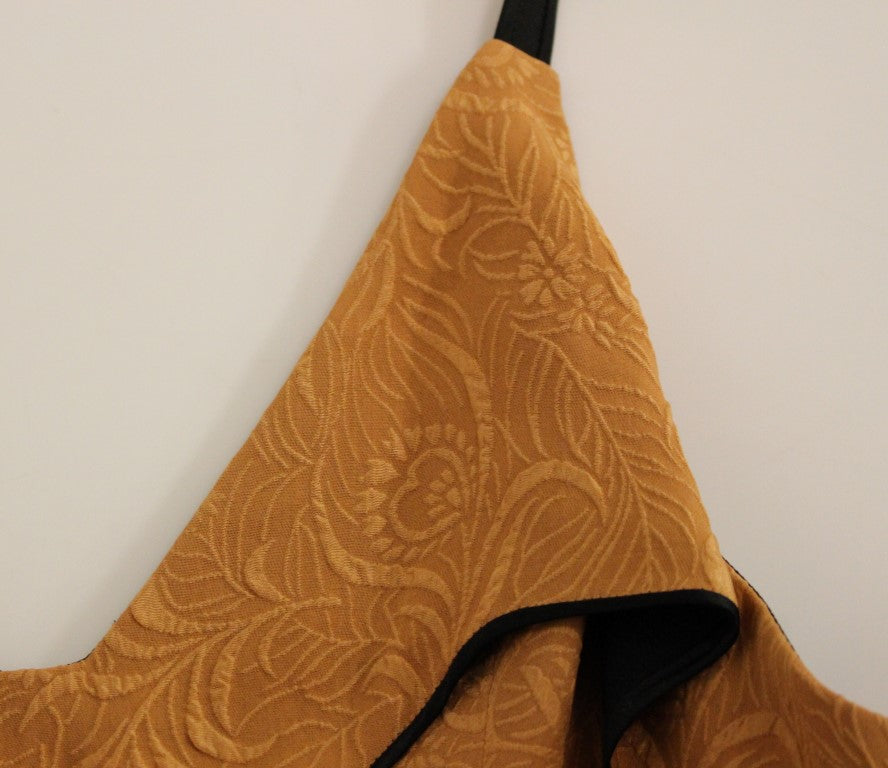 Robe fourreau sans manches en soie noire bronze de FILOS