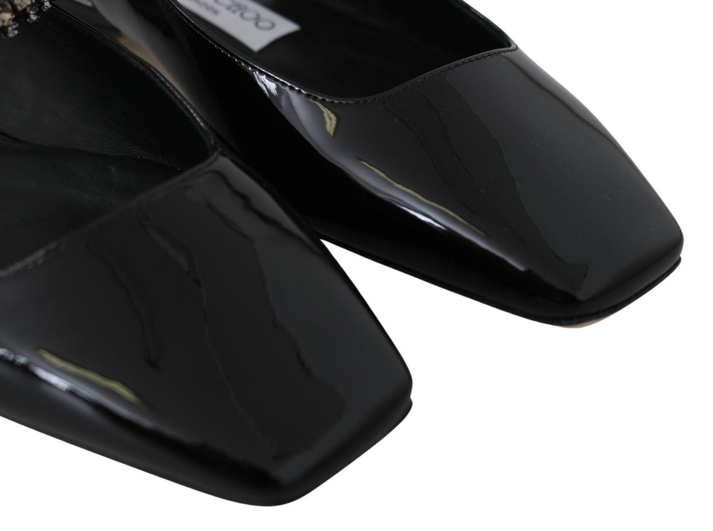 Jimmy Choo elegante zwarte lak flats met kristallen accent.