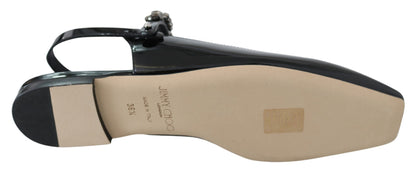 Jimmy Choo elegante zwarte lak flats met kristallen accent.