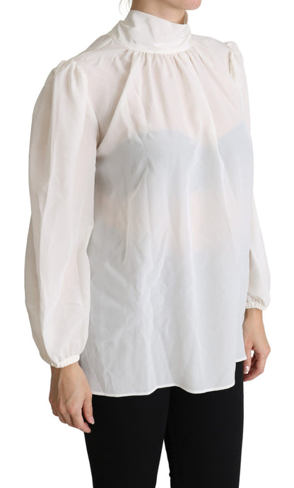 Blouse à manches longues en soie blanche avec nœud à la taille de Dolce & Gabbana