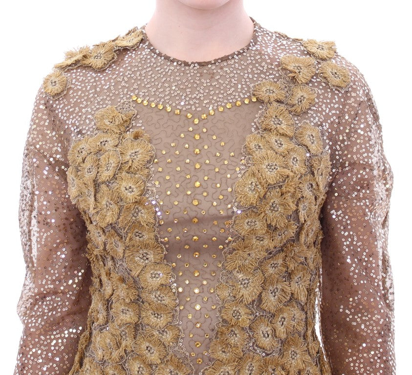 Robe longue en dentelle et cristal dorée de Lanre Da Silva Ajayi