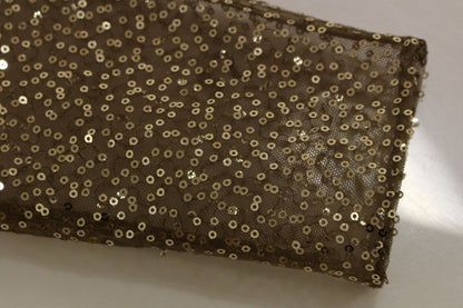 Robe longue en dentelle et cristal dorée de Lanre Da Silva Ajayi