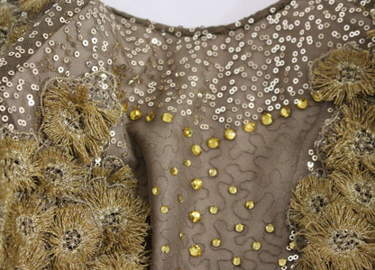 Robe longue en dentelle et cristal dorée de Lanre Da Silva Ajayi