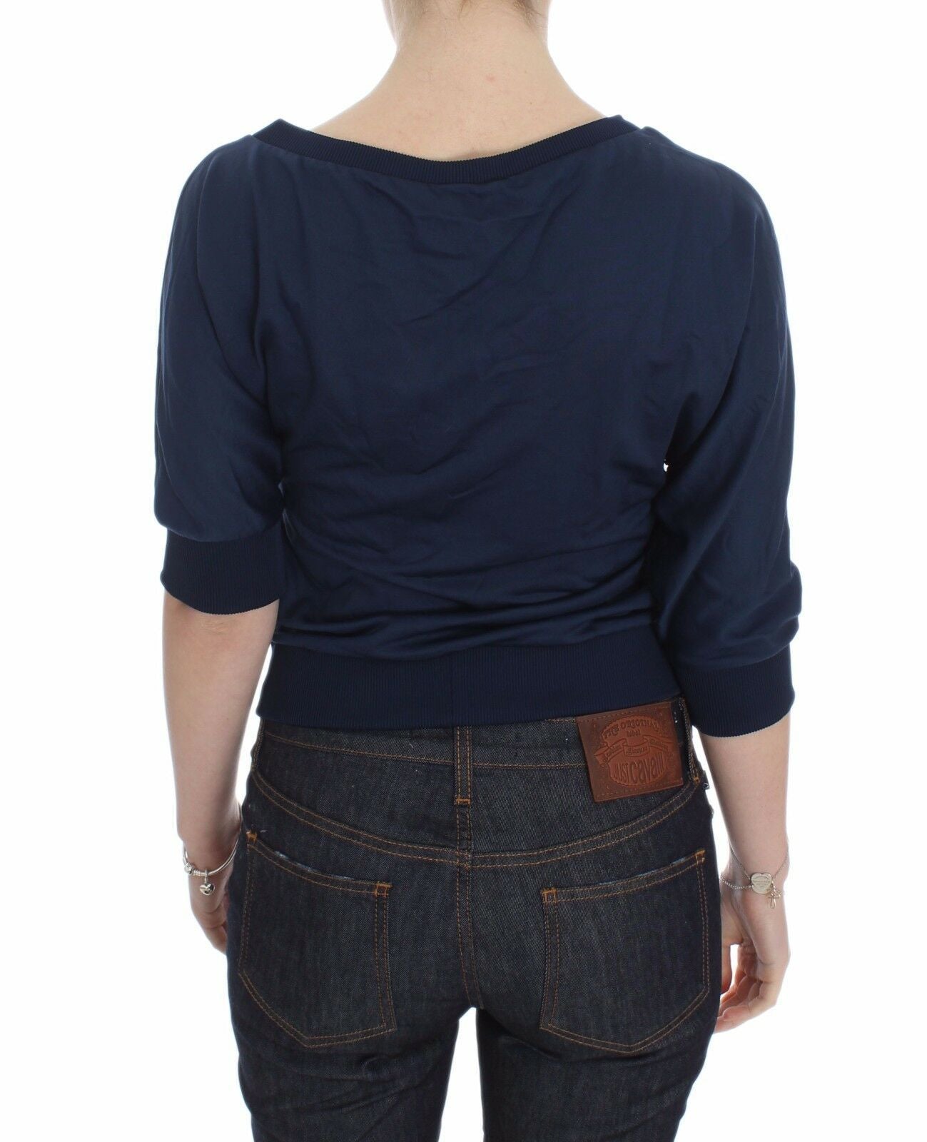 Pull en coton bleu Exte, col en V profond, pour femme.