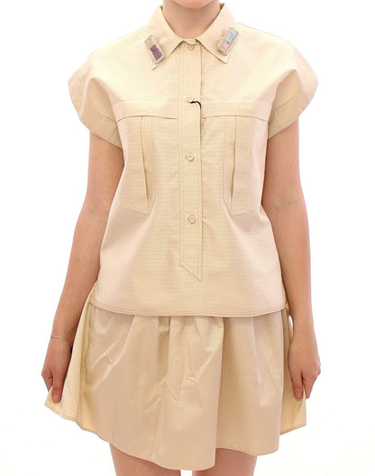 Blouse beige sans manches Andrea Incontri
