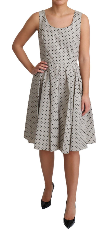 Dolce &amp; Gabbana A-lijn jurk van beige katoen met polkadotmotief