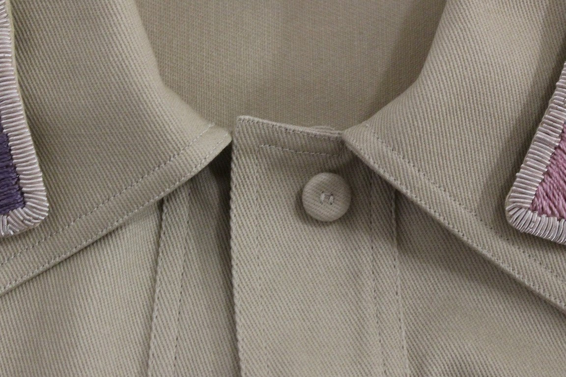 Blouse beige sans manches Andrea Incontri