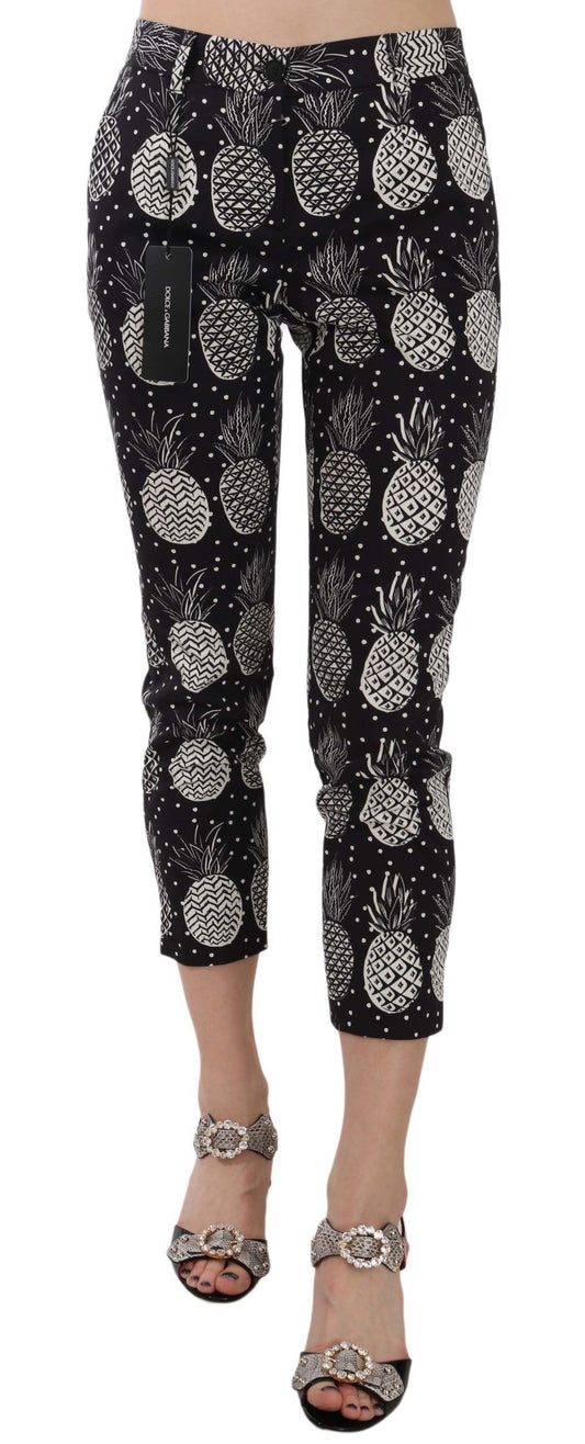 Dolce & Gabbana zwarte, aansluitende capri broek met ananasprint.
