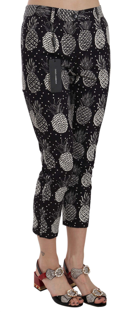 Dolce & Gabbana zwarte, aansluitende capri broek met ananasprint.