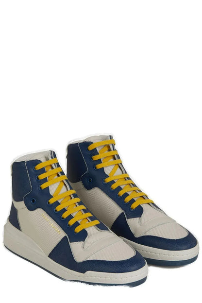 Saint Laurent : rehaussez votre style avec des baskets de luxe bleues mi-hauteur.
