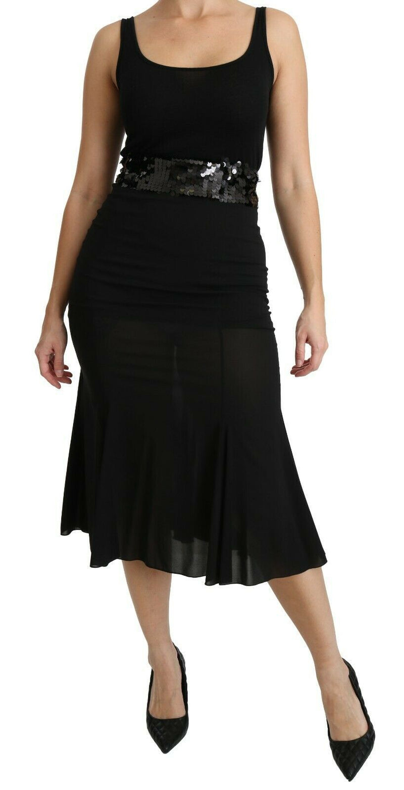 Jupe mi-longue en soie noire à taille haute, style sirène, de Dolce &amp; Gabbana.