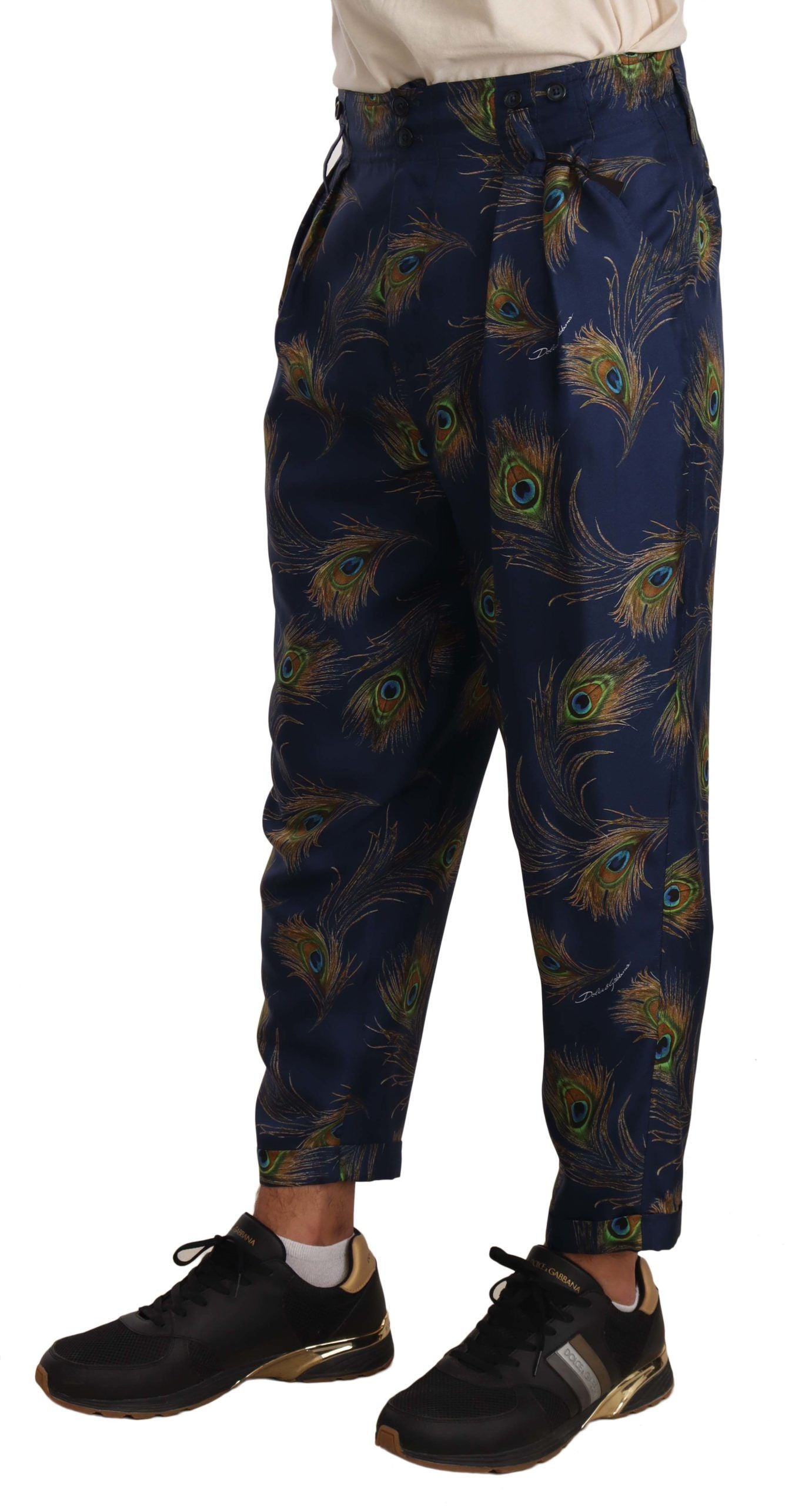 Pantalon en soie à imprimé paon bleu et coupe évasée de Dolce & Gabbana
