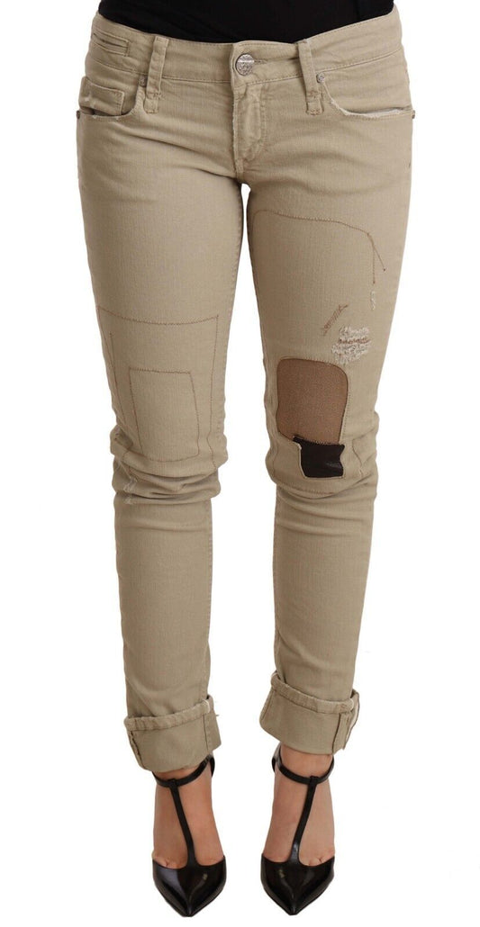 Pantalon slim en coton denim beige à jambes pliées Acht
