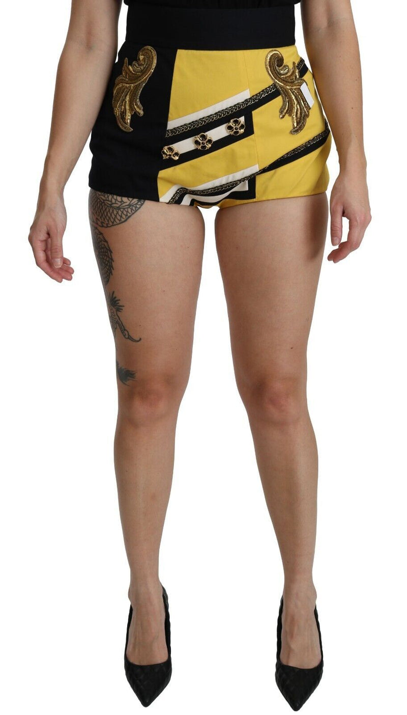 Shorts Dolce &amp; Gabbana en coton jaune et noir, ornés de strass.