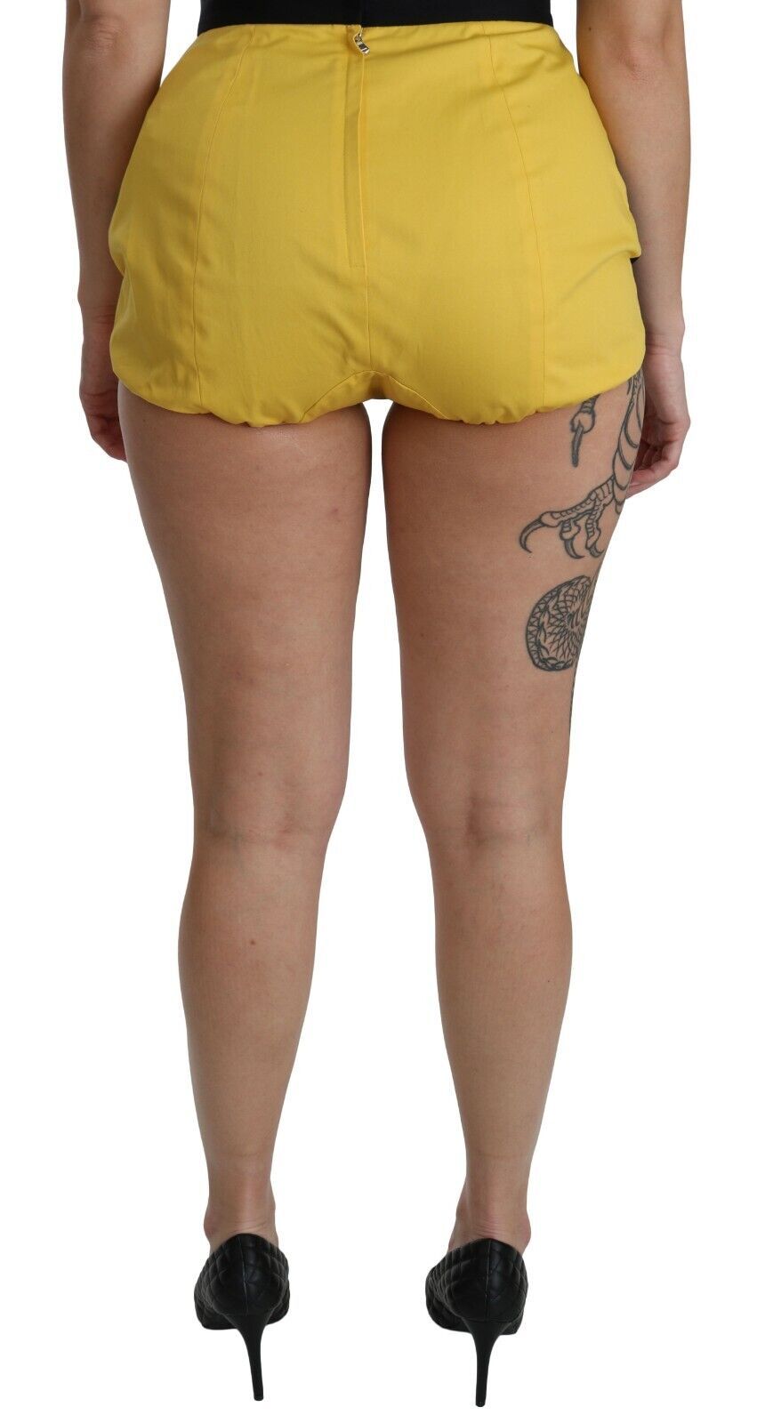 Shorts Dolce &amp; Gabbana en coton jaune et noir, ornés de strass.