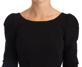 Robe noire moulante en laine extensible avec dos ouvert de Dolce &amp; Gabbana