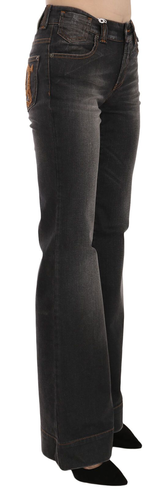 Jean décontracté en jean noir, taille mi-hauteur et jambes évasées, John Galliano.