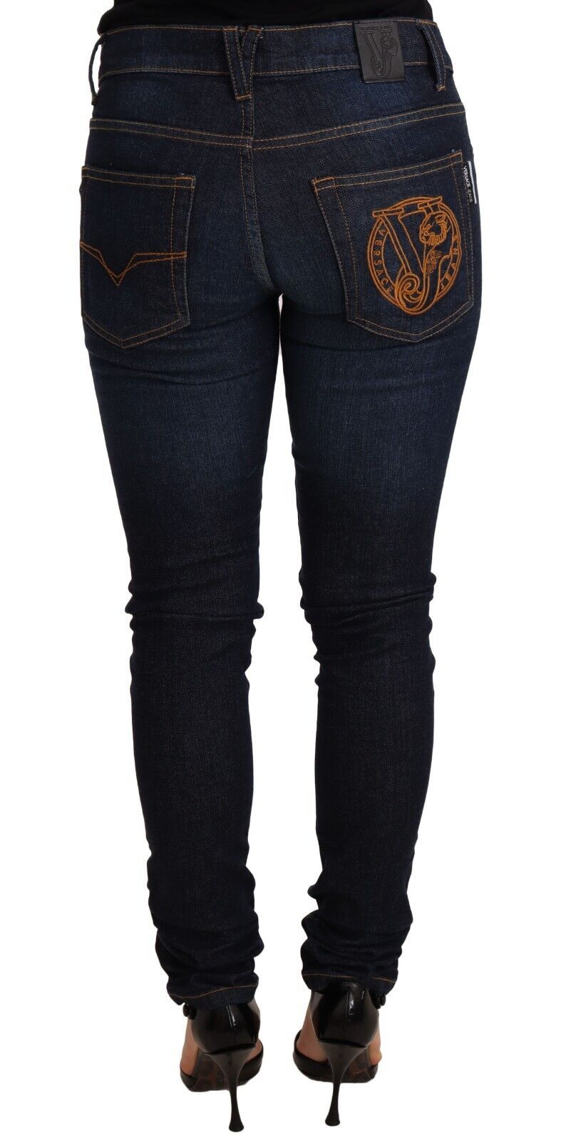 Jeans skinny en coton bleu foncé à taille basse de Versace