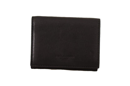 Portefeuille multi-poches Dolce &amp; Gabbana en cuir noir à trois volets avec ceinture