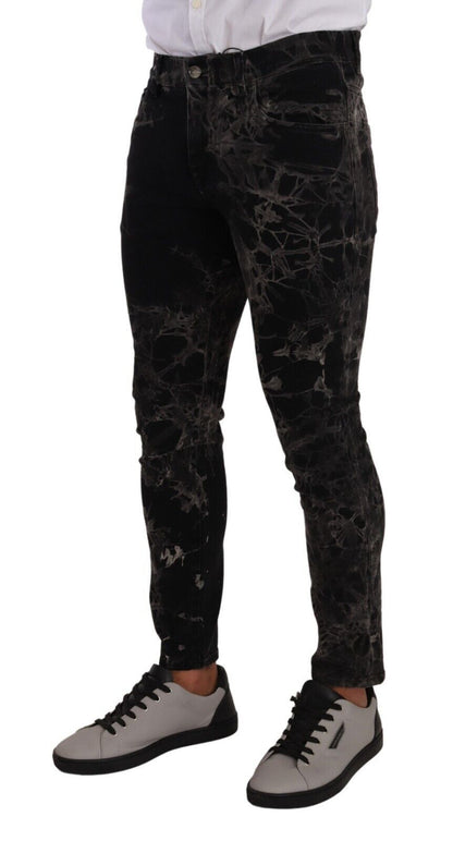 Jeans slim à coupe ajustée à motifs noirs de Dolce & Gabbana