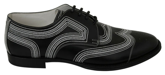 Chaussures habillées en cuir noir, style derby, avec lacets blancs de Dolce & Gabbana.