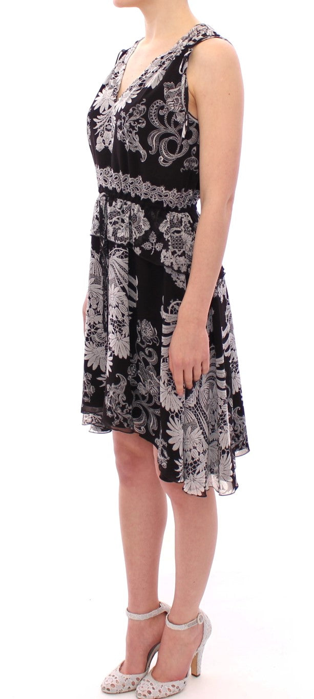 Robe cocktail fluide en soie noire à motifs floraux de Sachin &amp; Babi