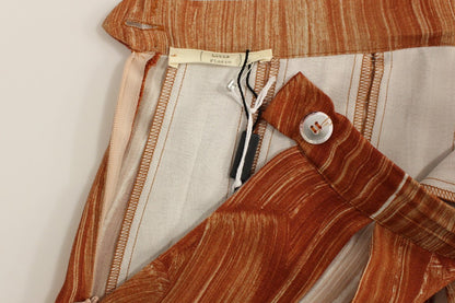 Jupe longue marron et orange de Licia Florio, longueur sous le genou.