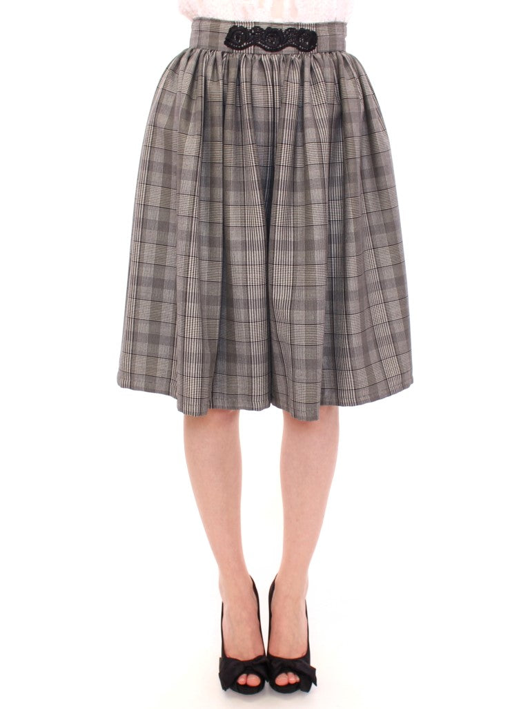 NOEMI ALEMÁN Jupe-short en laine grise à carreaux