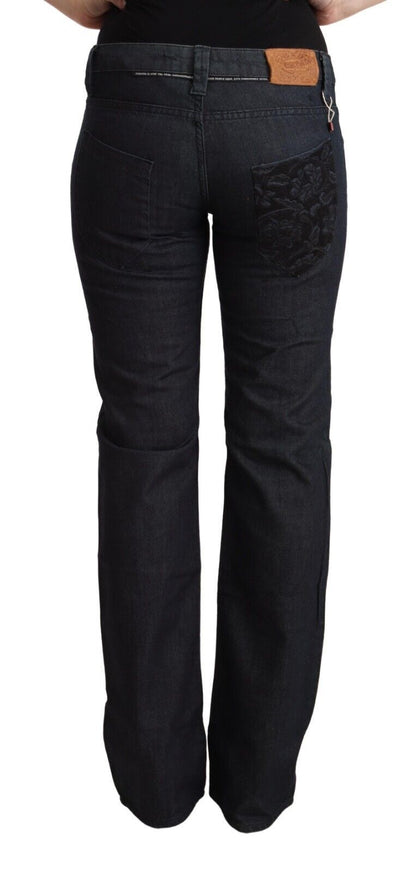 Exte donkerblauwe, rekbare katoenen, rechte jeans met lage taille.