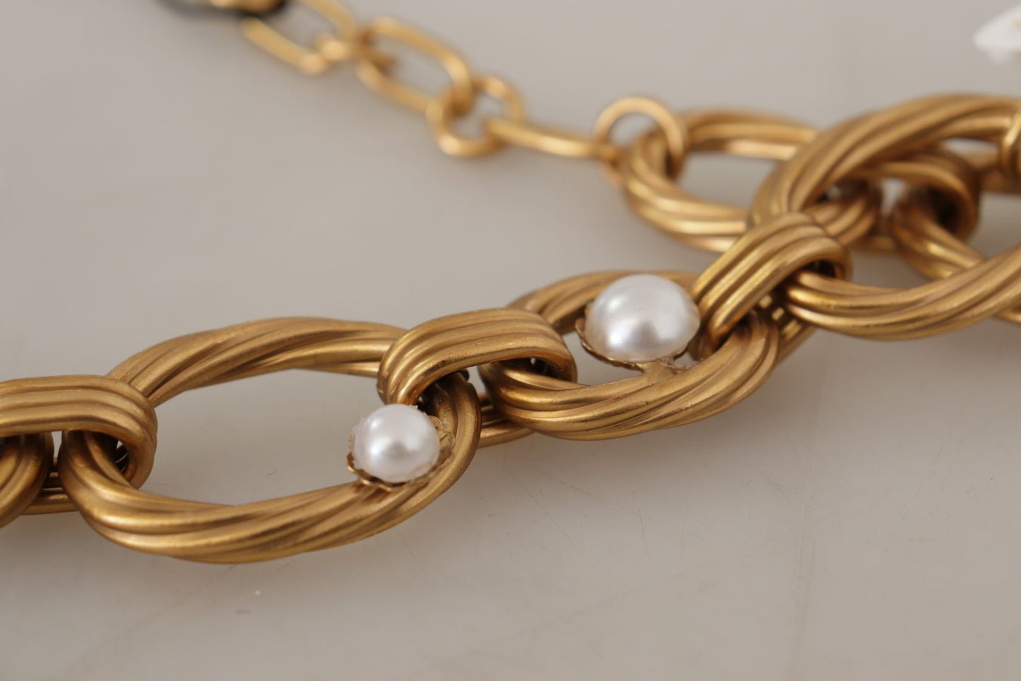 Collier Dolce & Gabbana en or et orné de fleurs de lys blanc