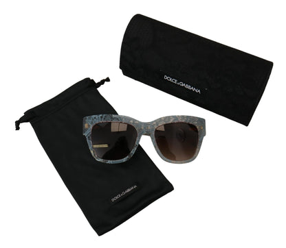 Lunettes de soleil Dolce & Gabbana DG4231 en dentelle bleue, acétate et cristal papillon