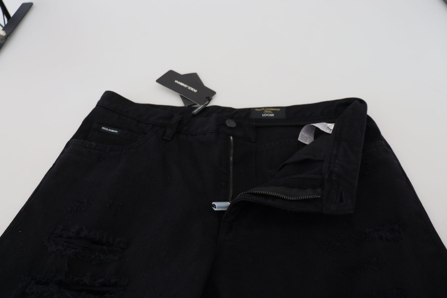 Jeans en coton noir, taille normale, coupe ample et déchirés de Dolce & Gabbana