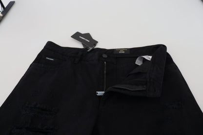 Jeans en coton noir, taille normale, coupe ample et déchirés de Dolce & Gabbana