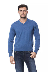 Pull en laine mérinos à col rond brodé, confectionné sur mesure par un créateur italien de renom.