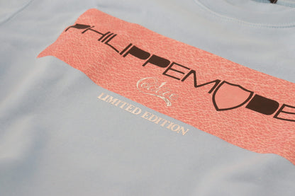 Pull à manches longues bleu clair avec logo imprimé de Philippe Model