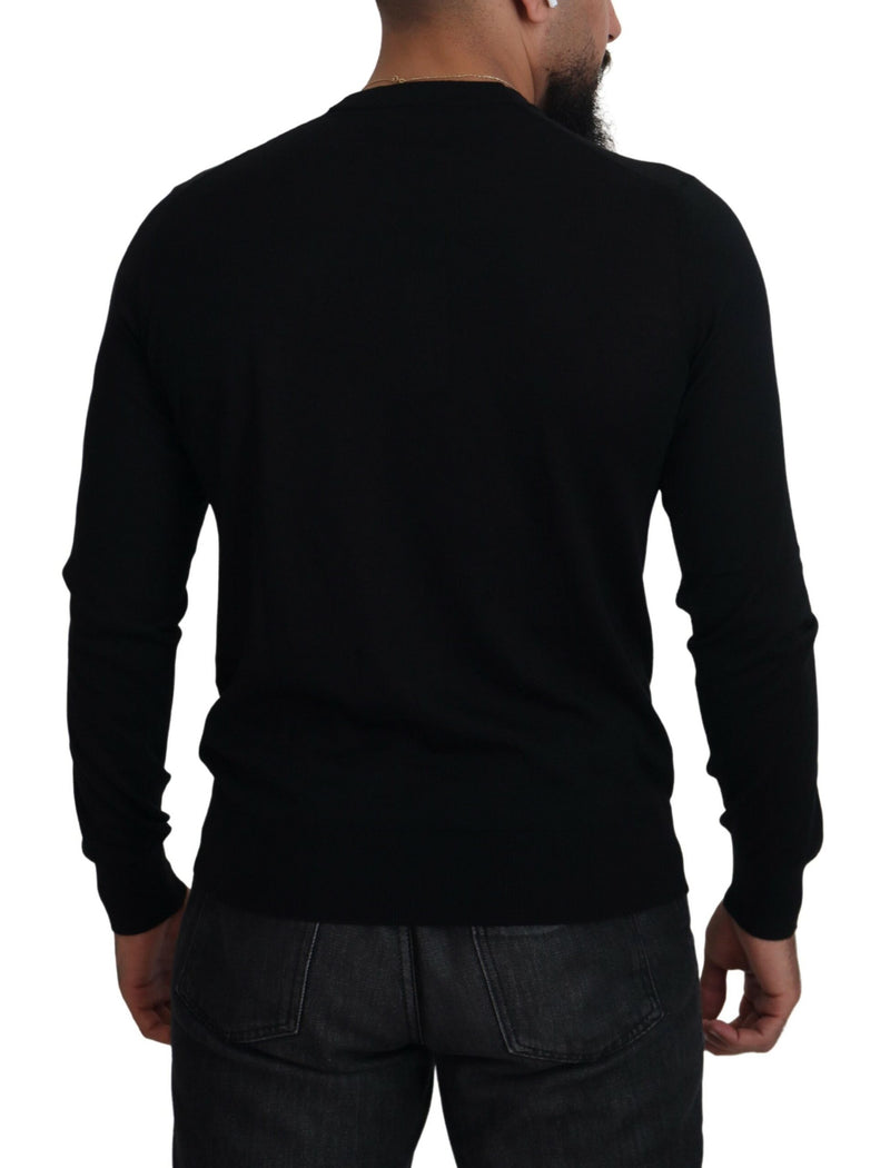 Pull en cachemire noir à boutons de Dolce &amp; Gabbana