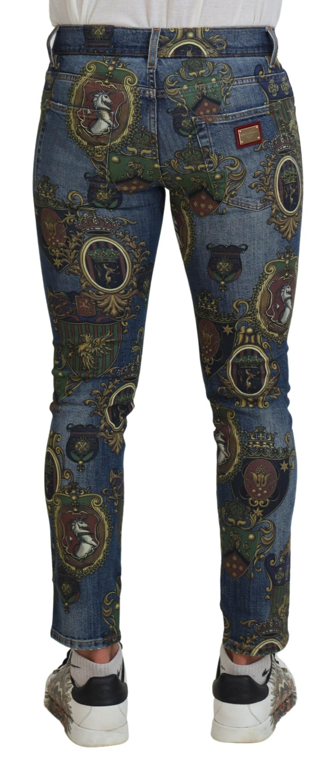 Jeans en coton slim à imprimé médaille bleu de Dolce &amp; Gabbana
