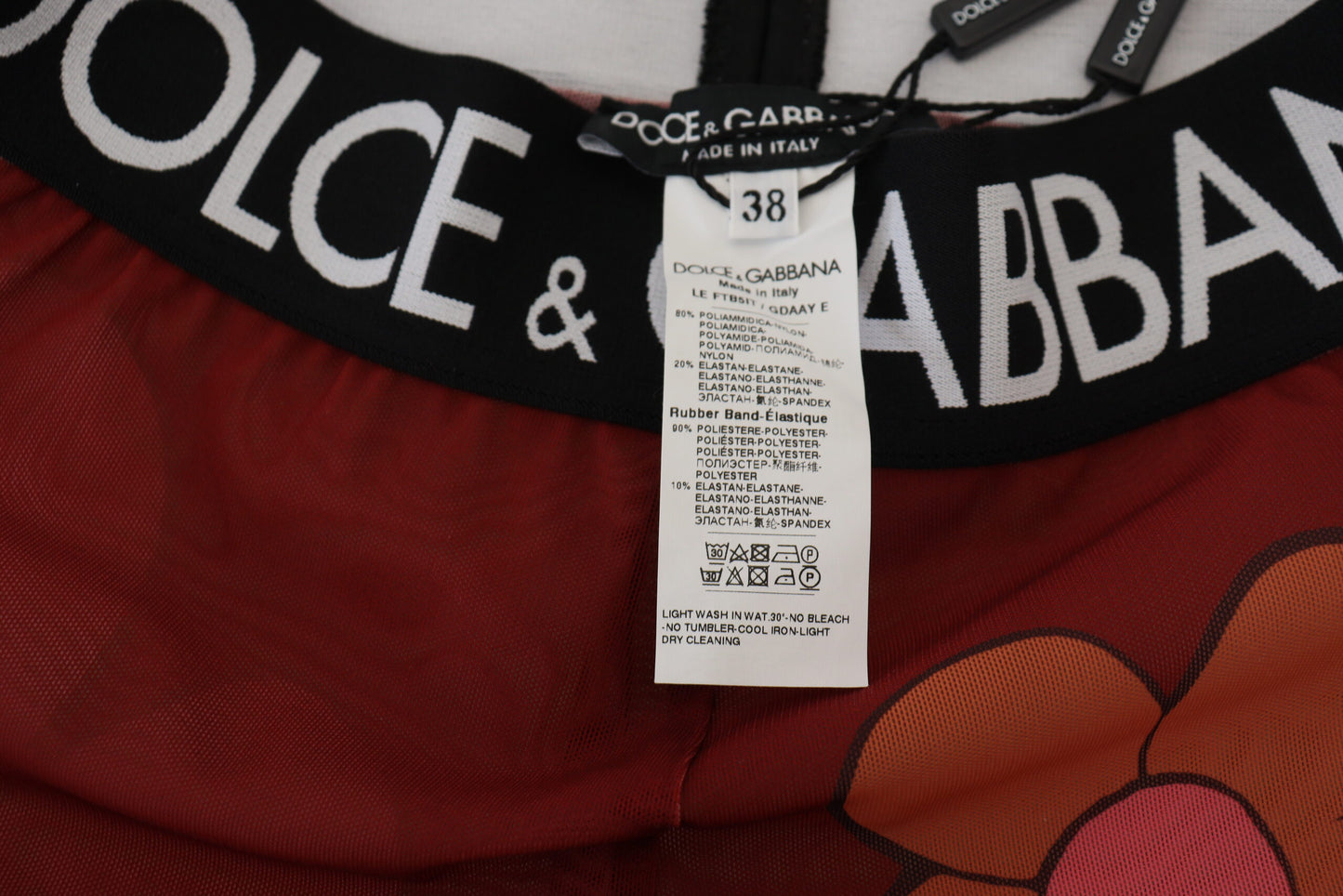 Dolce & Gabbana rode bloemenlegging met elastische taille.