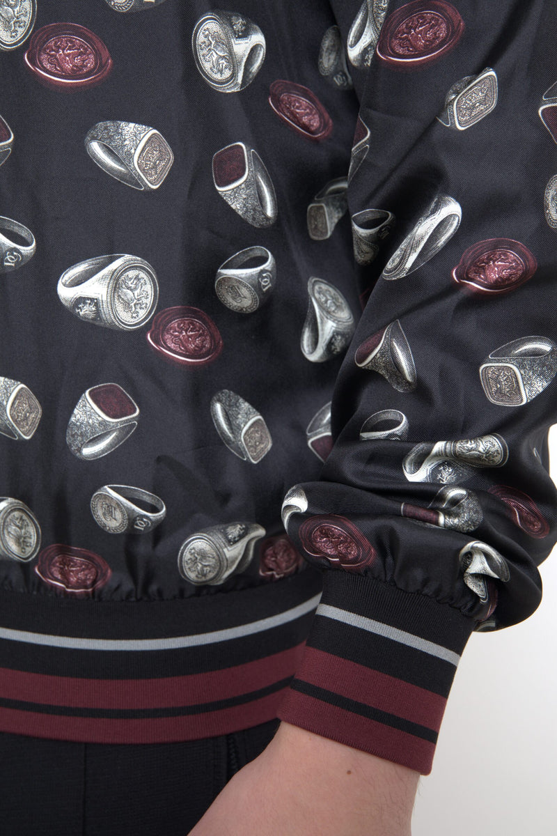 Dolce &amp; Gabbana Zwarte Crewneck Trui van Zijde met Ringmotief