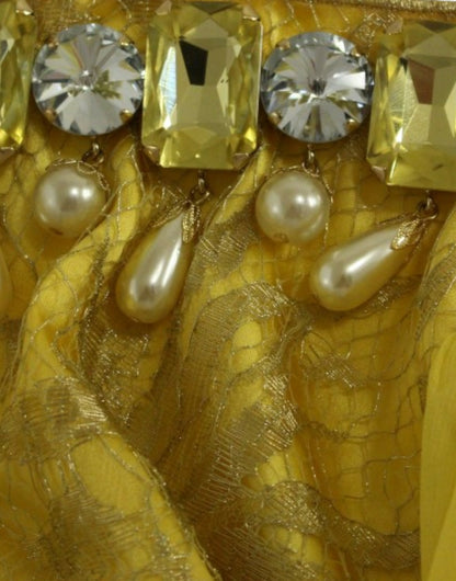 Mini-robe en dentelle jaune et strass de Dolce & Gabbana