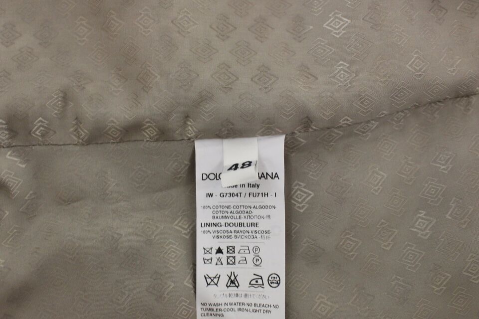 Veste-blazer Dolce & Gabbana en coton noir, type gilet-robe.