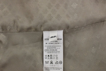 Veste-blazer Dolce & Gabbana en coton noir, type gilet-robe.